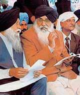  Punjab Chief Minister Parkash Singh Badal with minister Kanwaljit Singh during the SAD political conference on the occasion of Hola Mohalla at Anandpur Sahib on Saturday
