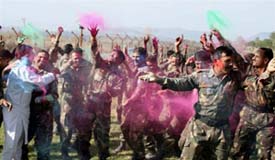 Army officers posted at the LoC in Pallanwala celebrate Holi 