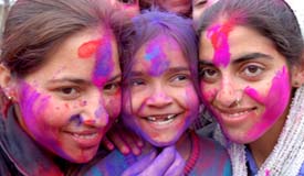 orphans affected by militancy play with colours in Jammu on Saturday. 
