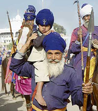 Nihangs take part in a procession on the concluding day of the Hola Mohalla at Anandpur Sahib on Sunday.