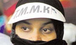 An activist of the Tamil Nadu Muslim Munnetra Kazhakam at a demonstration to demand exclusive reservation for Muslims for jobs and educational opportunities at Parliament Street in the Capital on Wednesday.