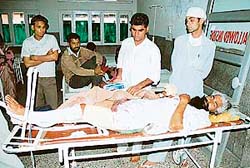 Rajinder Singh recuperates at the Civil Hospital, Bathinda, after being shot at by the police on Tuesday night