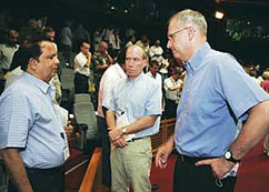Chief executive of European launch operator Arianespace Jean - Yves Le Gall (right) talks to an Indian official on Saturday in Kourou, French Guiana, after the launch of an Ariane 5 rocket carrying a TV satellite for India was delayed due to problems with the launchpad.