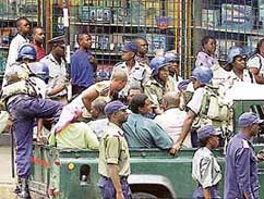 Opposition activists in police custody at Highfields in Harare on Sunday.