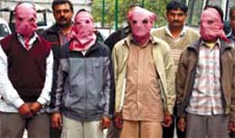 The accused in police custody. 
