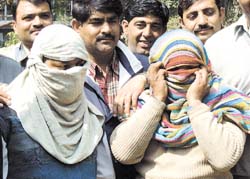 The two accused in police custody