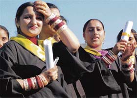 Students of Government College hold their degrees after the annual convocation of the college in Mohali