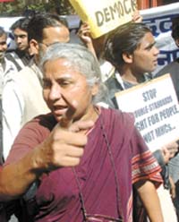 Social activist Medha Patkar shouts anti-government slogans during a protest march to Parliament in the Capital