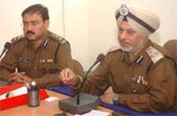 DIG (Jalandhar range) N.P. Singh (right) along with SSP Jalandhar Arpit Shukla interacts with mediapersons in Jalandhar on Thursday