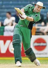 Jeremy Bray of Ireland hits a boundary during a Group D match of the World Cup against Zimbabwe at the Sabina Cricket Ground in Kingston on Thursday