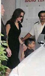 US actress Angelina Jolie leaves the Tam Binh orphanage with her previously adopted son in Ho Chi Minh City on