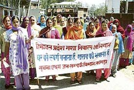 Women from Rait block participate in a rally against liquor menace at Chari village, near Dharamsala, on Friday