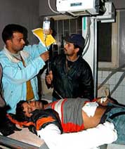 An injured in the blast gets treatment at a hospital in Baramula on Friday. 