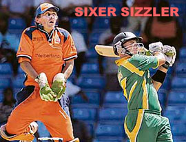 South Africas Herschelle Gibbs hits a six off Daan Van Bunge of the Netherlands during their World Cup match in St Kitts 