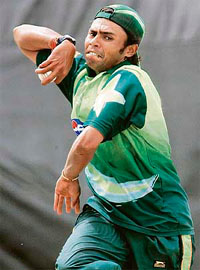 Pakistans Danish Kaneria delivers a ball during a practice session in Kingston 