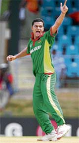 Bangladeshi bowler Mashrafee Mortaza appeals successfully for the wicket of Robin Uthappa during the Group B match at the Queens Park Oval in Port of Spain