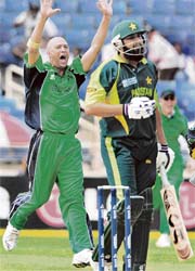 Irelands Andre Botha celebrates on dismissing Pakistan captain Inzamam-ul-Haq during their Group D match at Sabina Park in Kingston