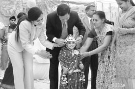 Deputy commissioner of Fatehabad O.P Sheoran crowns ‘Princess Tohana’ as school vice-president Dr Veena Singh looks on at a function held in Colonel Public School, Tohana, recently