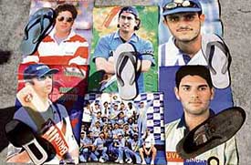 Slippers placed on the posters of Indian cricketers during a protest in Siliguri on Sunday