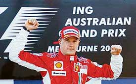 Ferrari Formula One driver Kimi Raikkonen of Finland celebrates after winning the Australian Grand Prix 
