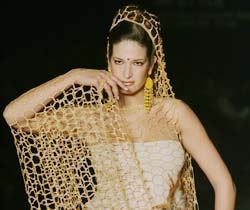 A model presents a creation by Greek designers Nikos-Takis during the Athens Fashion Week for autumn-winter 2007-08 at Zappion hall in Athens