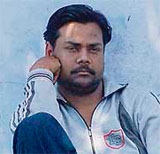 Sunil Kumar, accused of abducting two schoolgirls, outside a court in Mohali 