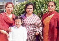 Five-year-old Shehnaz with her mother and principal of Dev Samaj College for Women, Sector 45, in Chandigarh.