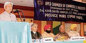 BJP leader Satpal Gosain addresses an industry meeting in Ludhiana on Monday.