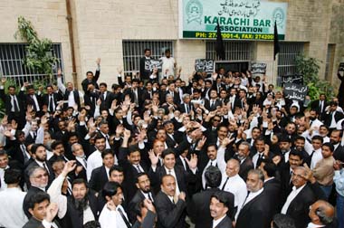 Pakistan lawyers raise slogans during a gathering in Karachi on Monday to protest against the suspension of Chief Justice Iftikhar Chaudhary
