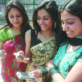 Students of Apeejay College of Fine Arts prepare for their farewell party