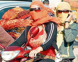 With mercury showing slight signs of rising, young girls are well prepared to protect themselves from heat in Ludhiana.