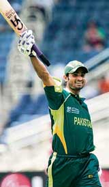 Pakistans Imran Nazir celebrates his century against Zimbabwe during a World Cup Group D match in Kingston on Wednesday. Nazir scored 160, the highest knock of this World Cup so far