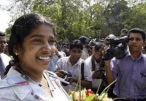 Tamil journalist Munusami Parameshwari walks outside the Magistrate Court in Colombo on Thursday. Parameshwari had been held in custody for four months since her arrest on November 21,2006, by the Terrorist Investigation Division of the Sri Lankan Police, which alleged her links with Tamil Tiger rebels, but was released after the Attorney-General's Department informed the courts that they do not have any charges against her.
