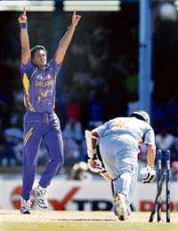 Sri Lankas Dilhara Fernando celebrates the dismissal of Sachin Tendulkar during the Group B match at the Queens Park Oval in Port of Spain on Friday. 