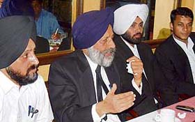 Members of the Lawyers for Human Rights International address a press conference in Chandigarh