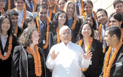 Railway Minister Lalu Prasad Yadav poses for a photograph with visiting