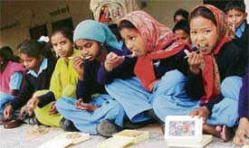 For many kids in Madhopur, this is their first meal of the day