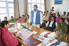 Members of the Block Development Committee, Kangra, hand over a memorandum to additional deputy commissioner Nandita Gupta on Monday