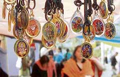 With the Navratras on, lockets with images of gods and goddesses are much in demand outside temples in Shimla