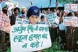 Parents and students of Kendriya Vidyalaya No. 2 hold a protest outside the school on Monday. 