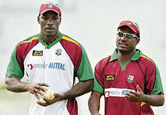 West Indies captain Brian Lara (right) with team-mate Chris Gayle during a practice session at the Antigua Recreation Ground in St Johns on Sunday. West Indies take on Australia in the first Super Eight match on Tuesday.