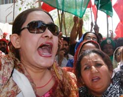 Supporters of the Pakistan People's Party chant slogans during a rally in Hyderabad on Monday. 