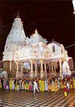 Pilgrims await their turn for darshan of the pindis at the Bajjreshwari temple at Kangra