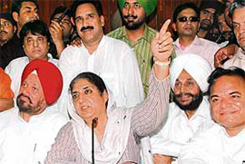 Congress leader Rajinder Kaur Bhattal addresses a press conference in Jalandhar