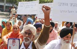 Members of the Khalra Mission Organisation stage a dharna in Jalandhar on Wednesday. 