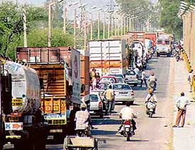 Traffic zams are frequent on the old Ghaggar bridge near Nadha Sahib in Panchkula.
