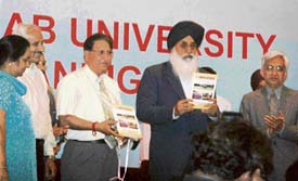Punjab Chief Minister Parkash Singh Badal releases “Campus Reporter” during a prize distribution function at Panjab University,Chandigarh, on Friday.