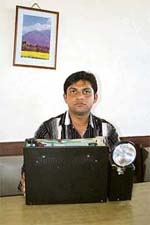 Aziz Ahmed with his earthquake-warning device at Dharamsala on Friday