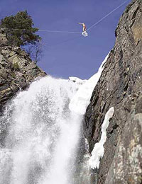 Norwegian balancing act performer Eskil Ronningsbakken balances on an ice cube 900 feet above a glacier-fissure in Dovrefjell Nation Park, 600 km north of Oslo. Eskil said he performed the stunt to demonstrate in a small scale how dangerous global warming can be, according to local media. The ice cube measuring 24x14 inches was tightened at each end by two ropes.