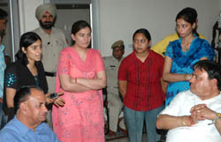 Students of the St Soldier College of Physiotherapy and Rehabilitation, Khambran, complain to the police in the presence of Anil Chopra, chairman of the college, on Saturday.